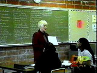 Pat McCormick talk to her students